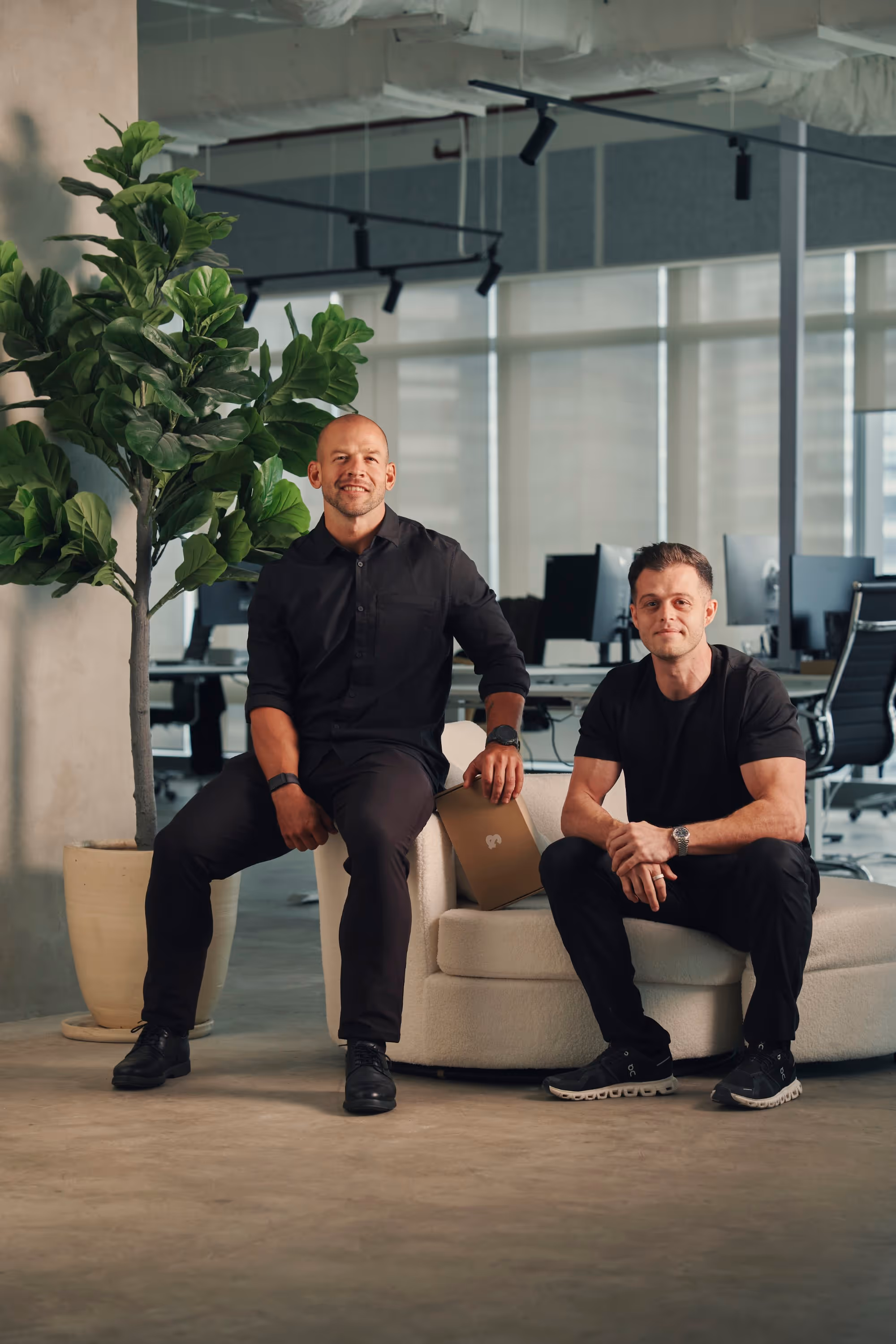 Jordan and his &you co-founder seated in the Manila office
